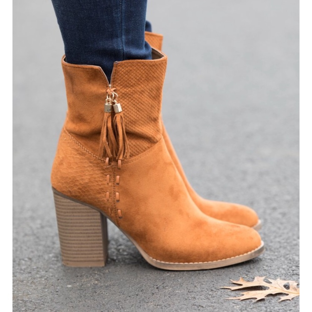Women’s cognac tassel booties size 8